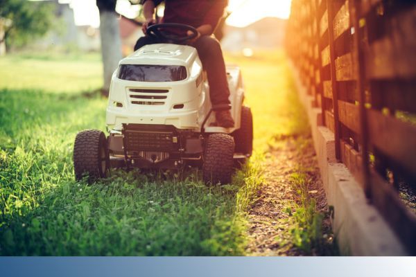 person on riding mower