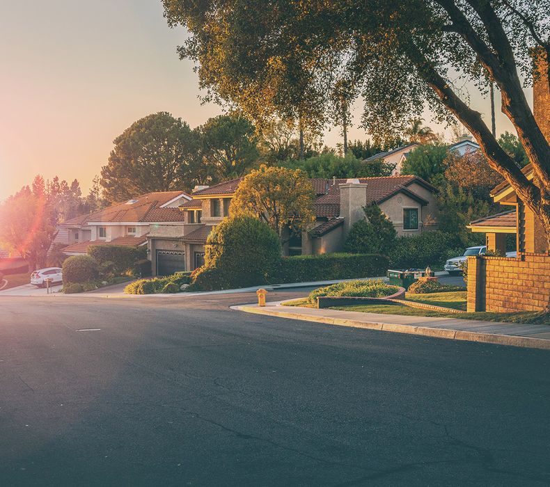 an image of a street of single family homes