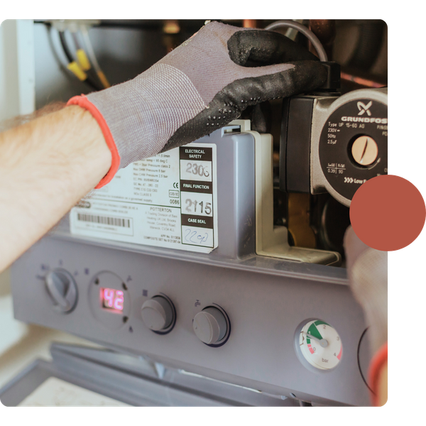 HVAC repair technician working on furnace Areas We Serve 2.png