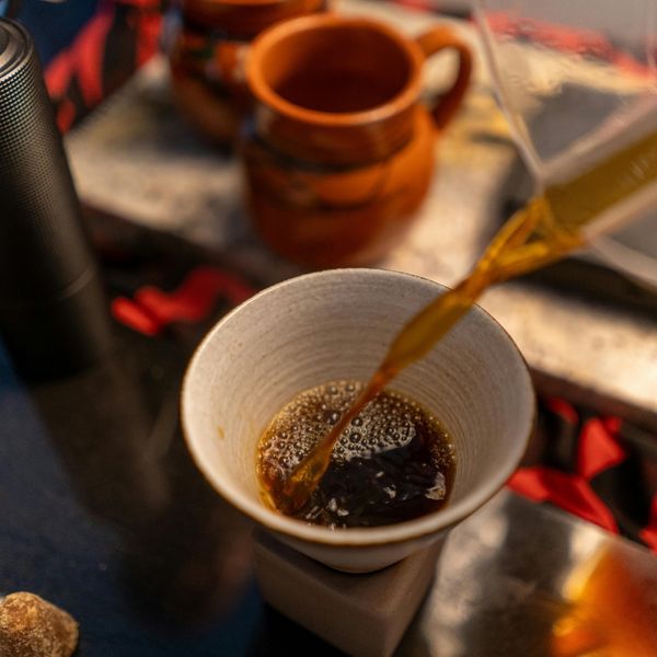 Pouring water in a cup