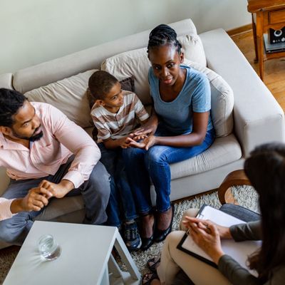 family discussing child custody with lawyer