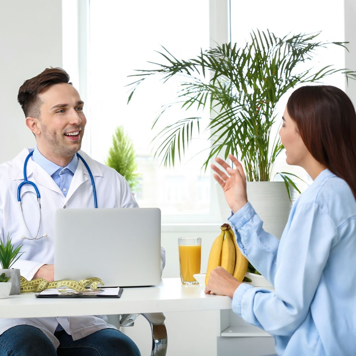 Physician talking to patient