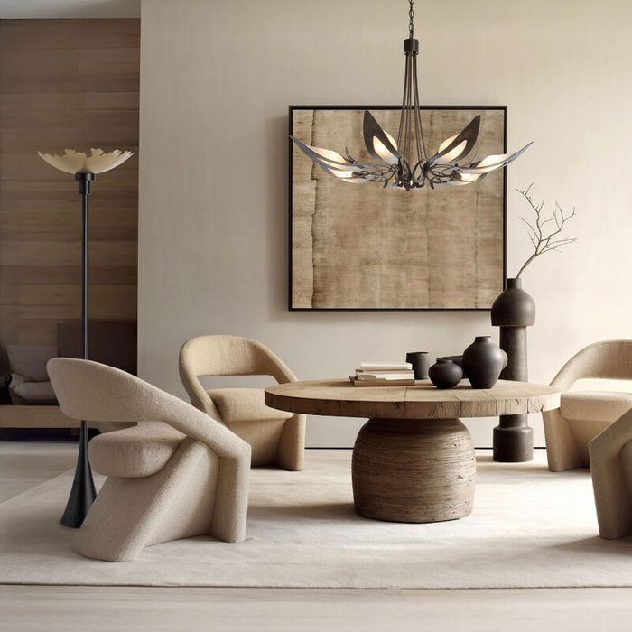 bedroom sitting area with a flower shaped chandelier