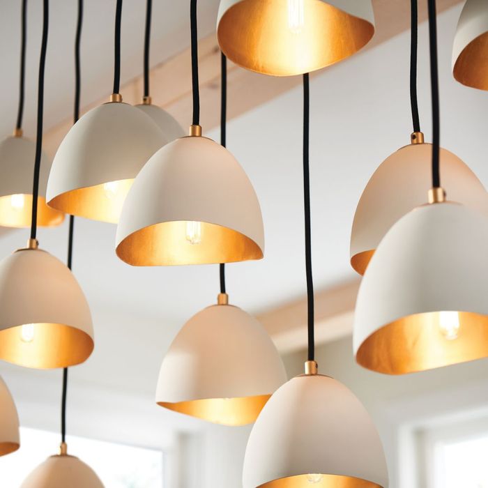 mass of warm hanging lights, close-up