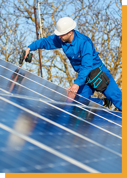 Man installing solar panels