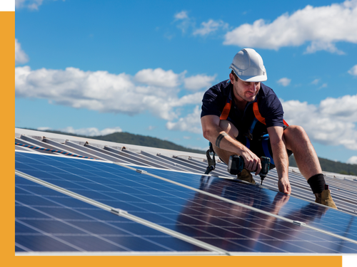 image of a worker installing a solar panel