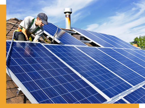 Image of worker installing residential solar panels
