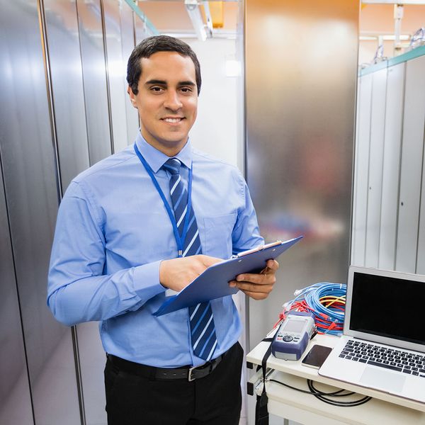 man checking data servers