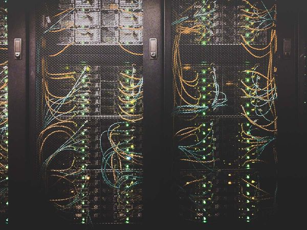 image of servers behind mesh doors
