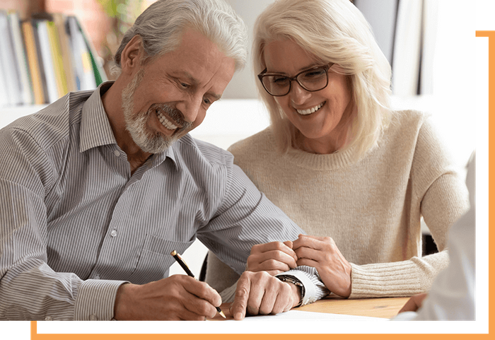 image of a couple signing legal documents