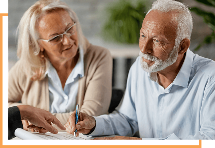 image of a couple signing legal documents