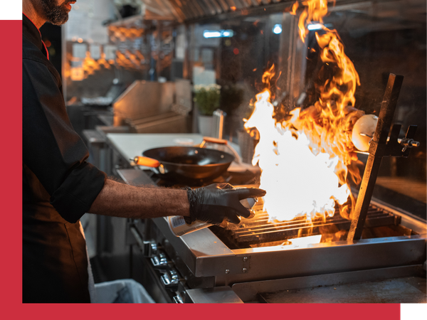 cooking with fire in a commercial kitchen