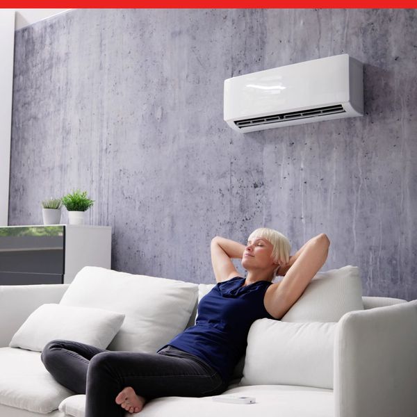 woman who is comfortable in her home with AC