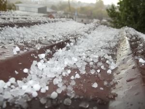 Metal roof with hail on it