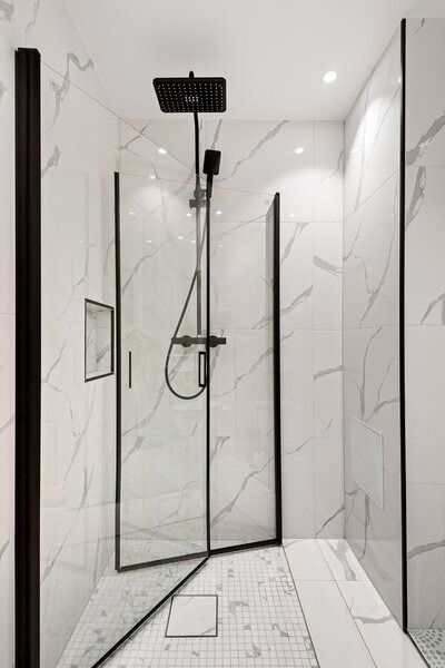 marble shower with rainfall shower