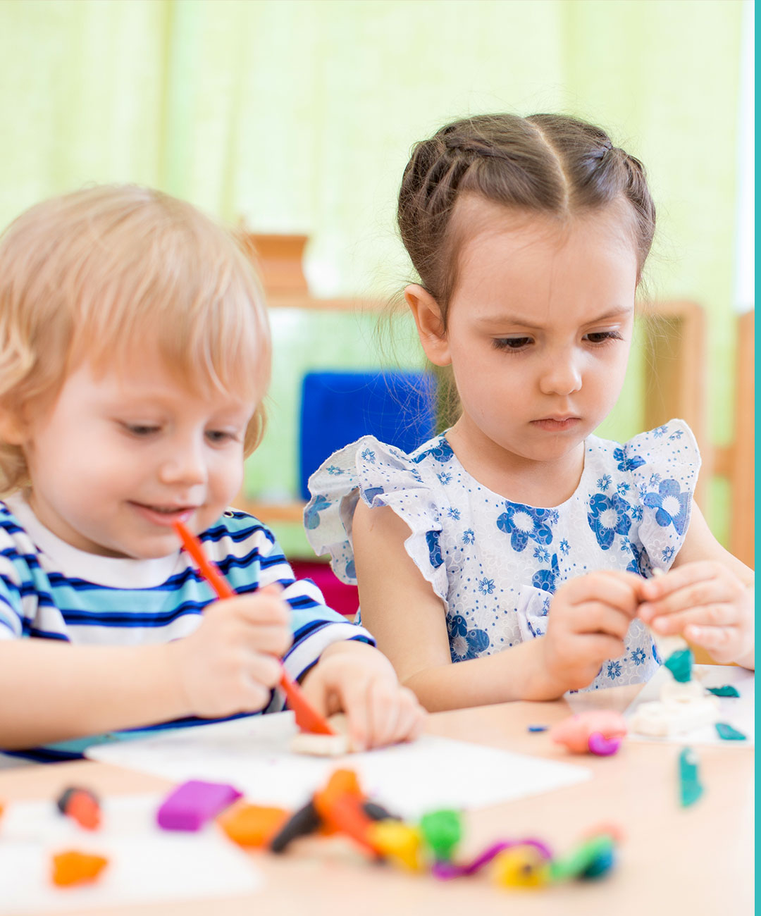 Children doing crafts at table