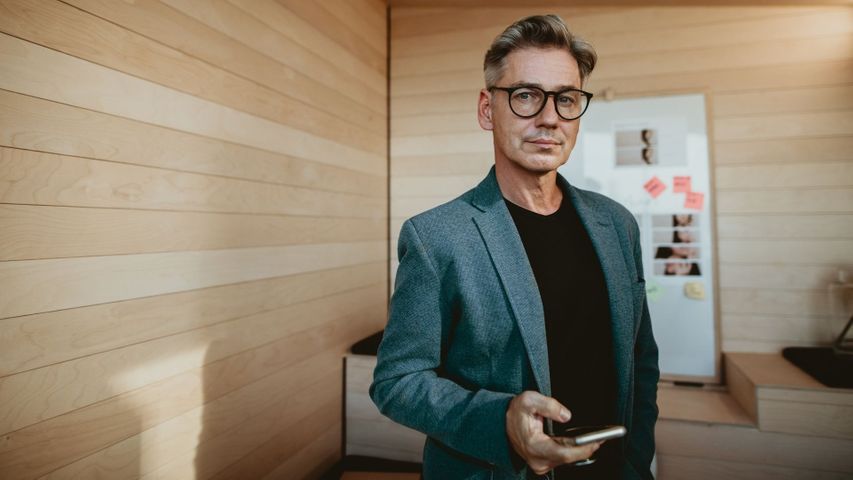 Male CEO on his phone.