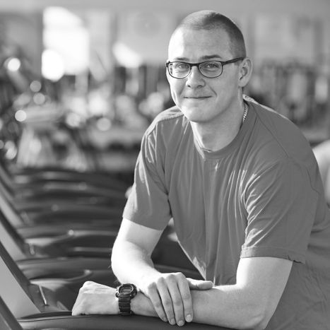 2 - personal trainer leaning on treadmill.jpg