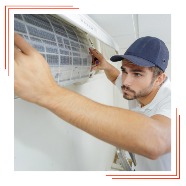 man working on hvac unit about 1.png