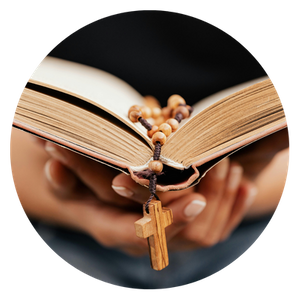 A bible open to a rosary in the page