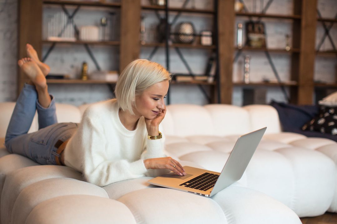 young-female-lying-on-bed-use-laptop-computer-for-2021-10-14-18-38-15-utc.jpg