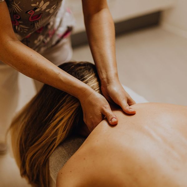 closeup of a woman receiving a swedish massage