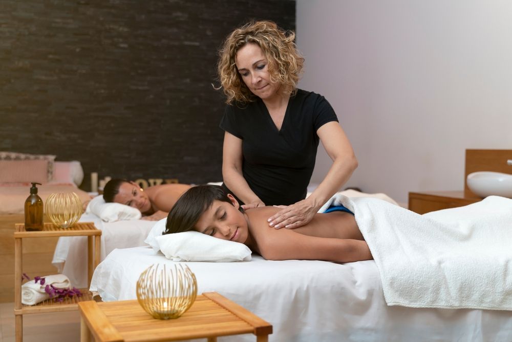 Parent and child enjoying a massage, one of the best family activities