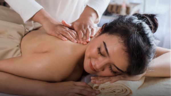 woman getting a thai massage