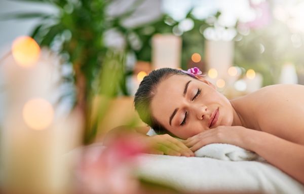 A woman getting massage therapy for her insomnia