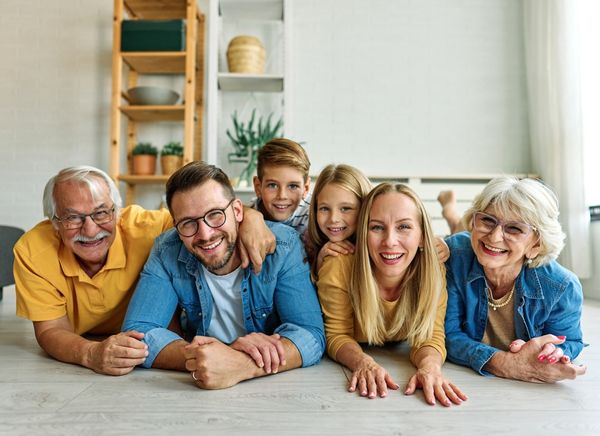  A happy family of three generations spending time on family activities