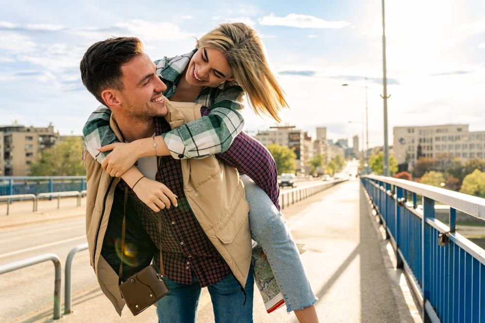 A couple on an outdoor walk, one of the best date ideas for a relaxed weekend together