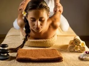 closeup of a woman receiving a thai massage