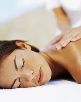 Closeup of a woman receiving a massage