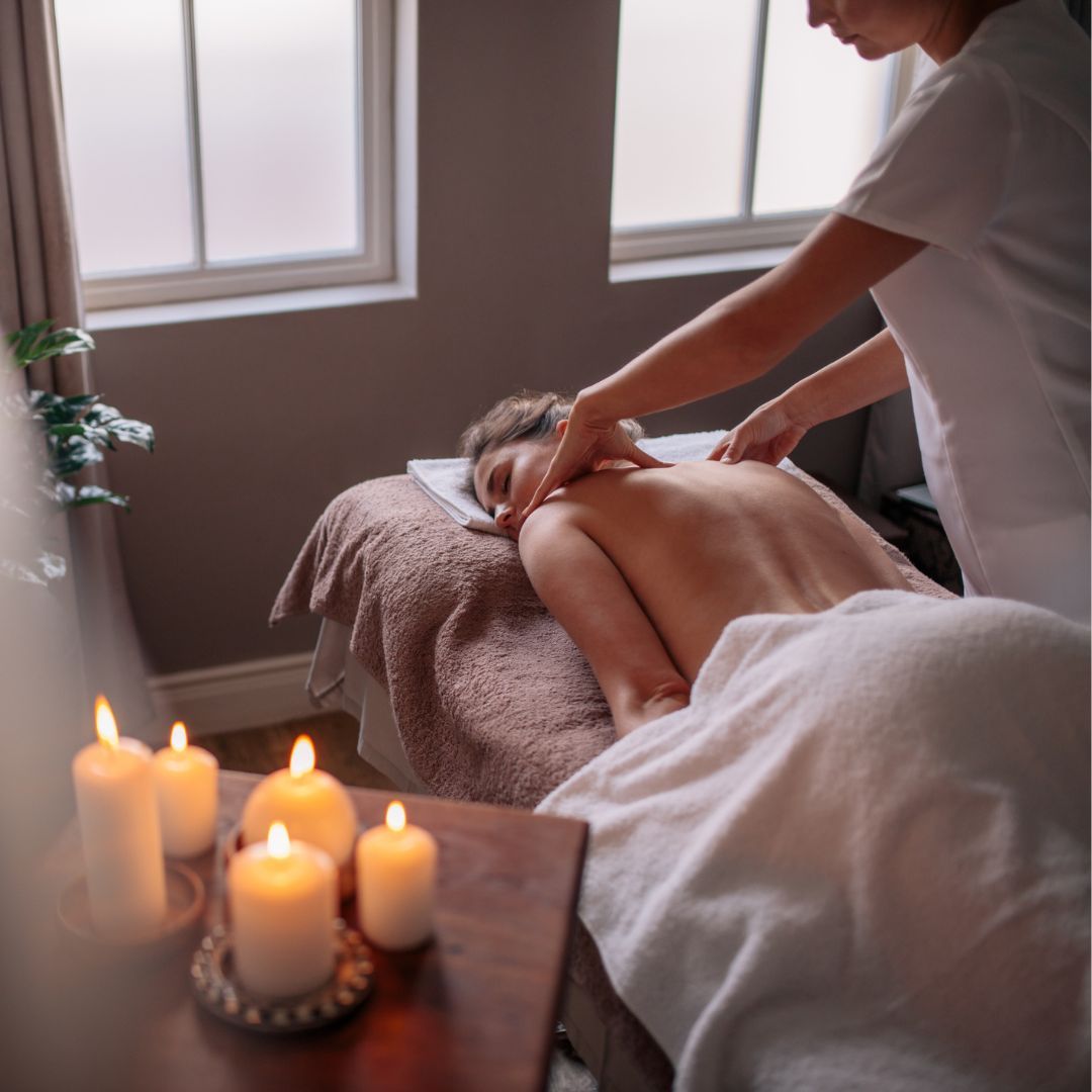 woman receiving a thai massage 