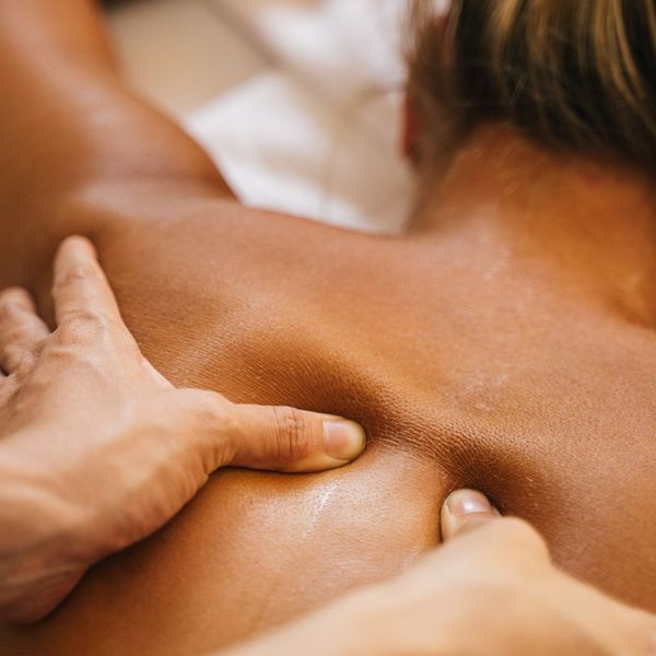 closeup of a woman receiving a swedish massage