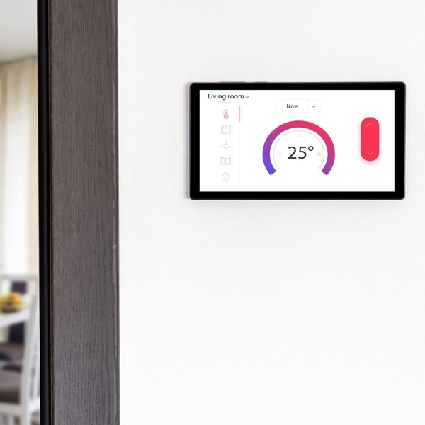 smart thermostat on a wall