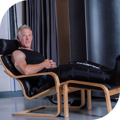 person sitting in compression chair