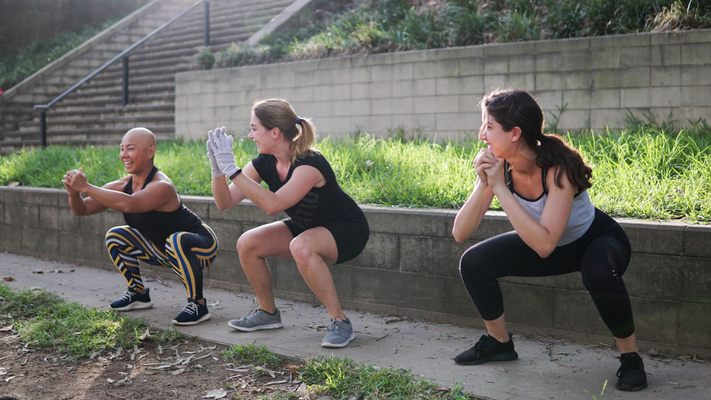 Three athletes working out