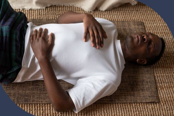 man practicing controlled breathing