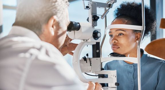 woman getting eye exam