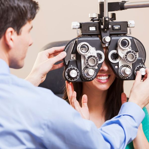 young woman getting an eye exam
