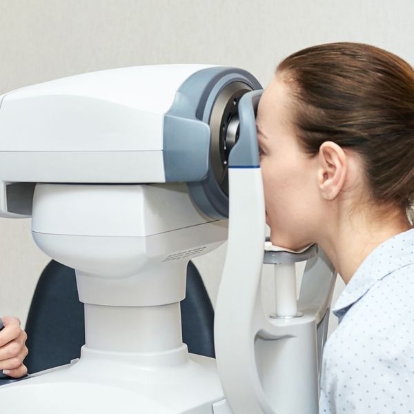 woman having an eye exam woman having an eye exam