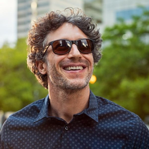 Man smiling with sunglasses on