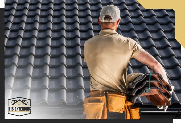 roofer holding shingles