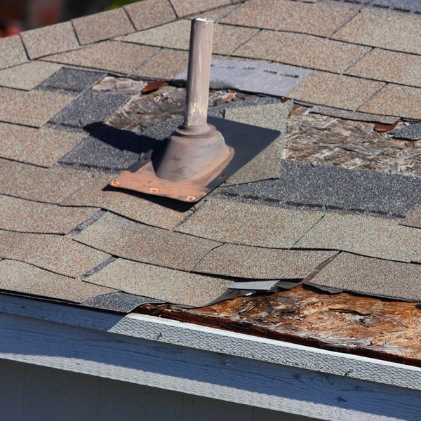 curling and missing roof shingles