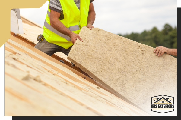 Roofing contractors at work installing a roof Install St Louis Park-2.png