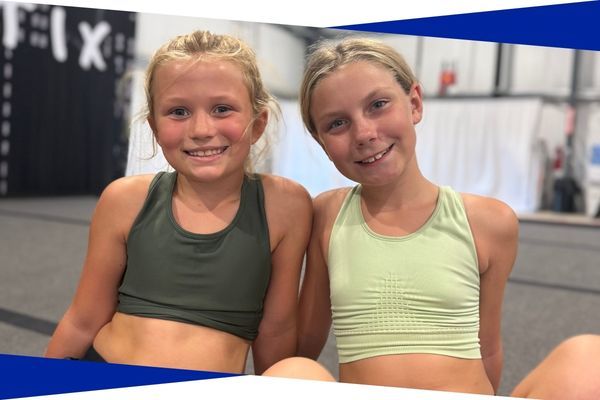 two young girls at a youth tumbling class