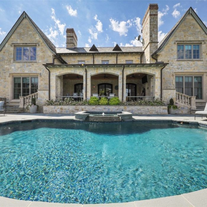 Luxury home exterior with a pool