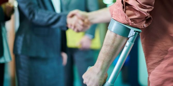 injured worker and lawyer