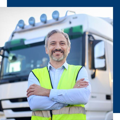 truck driver standing in front of truck